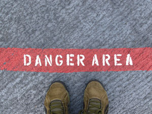 Be mindful of the danger before crossing the line. Photo copyright of Jef Poskanzer on Flickr.