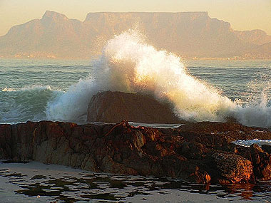 Some crashes can look spectacular, like this crashing wave near Cape Town, South Africa. Photo copyright of Victor Geere on Flickr.