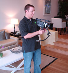 Videographer Tim Kent works with state-of-the-art equipment to make videos for Hill & Co. luxury properties.