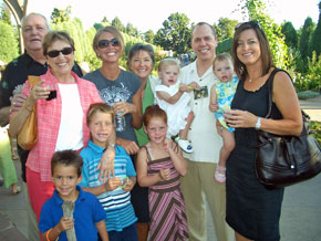 Jon Larrance, Vice President of Perry & Co., surrounded by friends and family.