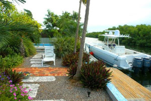 The dock at Jimmy Buffett's Key West home is suitable for most boats.